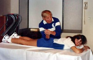 Bonnie giving myotherapy to a student